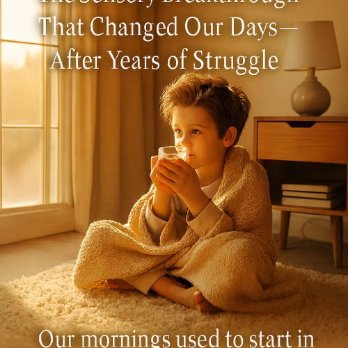A young boy sits cross-legged on a soft, cream-colored rug in a sunlit bedroom, wrapped in a cozy knit blanket and holding a warm drink. Golden morning light streams through a large window, casting a peaceful glow on his face. A wooden nightstand with books and a lamp sits in the background. Overlay text reads: “The Sensory Breakthrough That Changed Our Days—After Years of Struggle” at the top, and “Our mornings used to start in chaos. Now they begin with calm.” at the bottom.